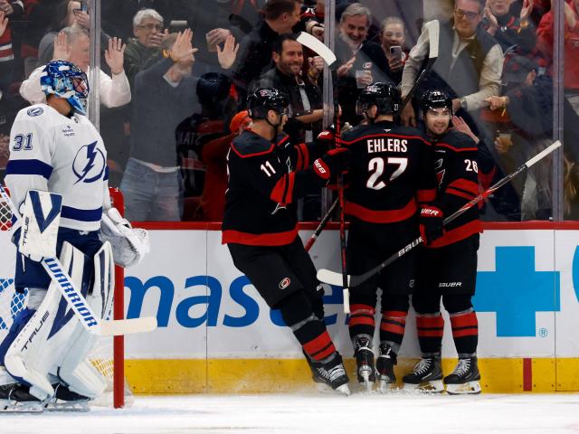 Aho's power-play goal helps Hurricanes beat Lightning 5-4 in meeting of Eastern Conference's best
