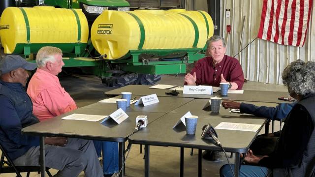 Cooper slams 'erratic' tariffs in Senate campaign stop at Wilson farm